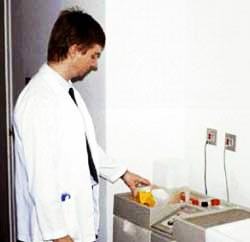 Image showing: A radiographer wearing a personal dosimeter